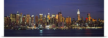 Load image into Gallery viewer, GREATBIGCANVAS Entitled Skyscrapers lit up at Night in a City, Manhattan, New York City, New York State Poster Print, 90&quot; x 30&quot;, Multicolor
