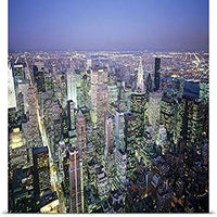 GREATBIGCANVAS Entitled Buildings Lit Up in a City a Night, Manhattan, New York City, New York Poster Print, 60